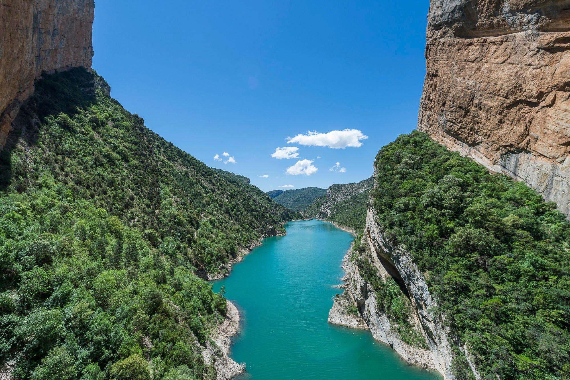 Aerial view of the turquoise Noguera Ribagorçana river between the limestone walls of the Congost de Mont-rebei